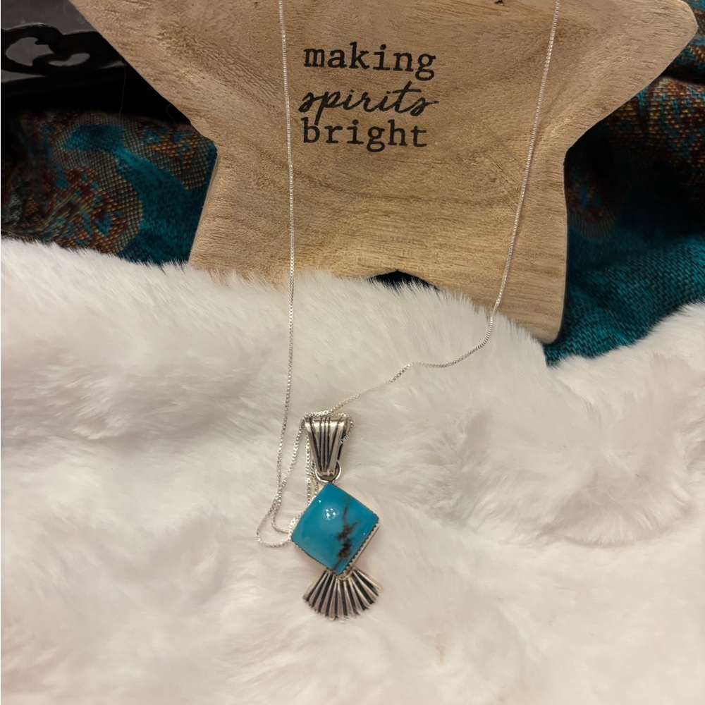 Sterling turquoise pendant with sterling chain by Marie jones.
